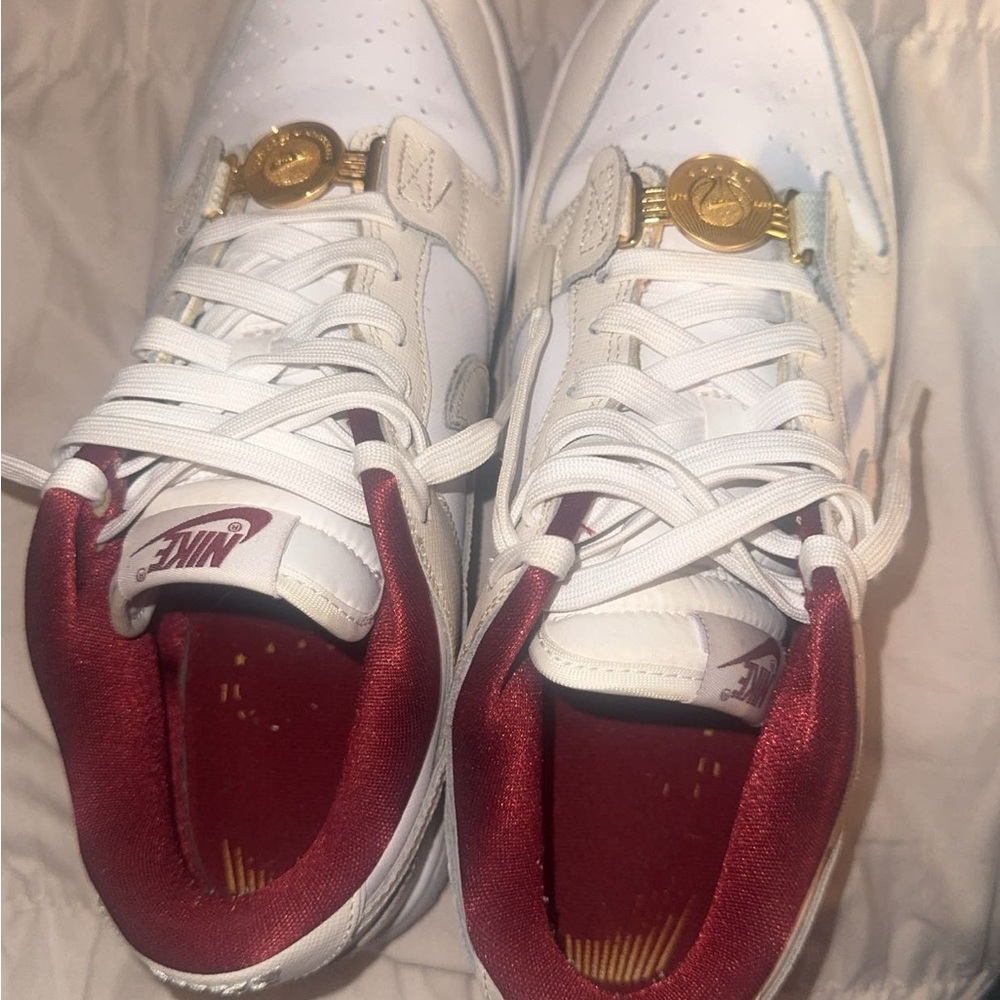 Nike White Sneakers with Red and Gold Details